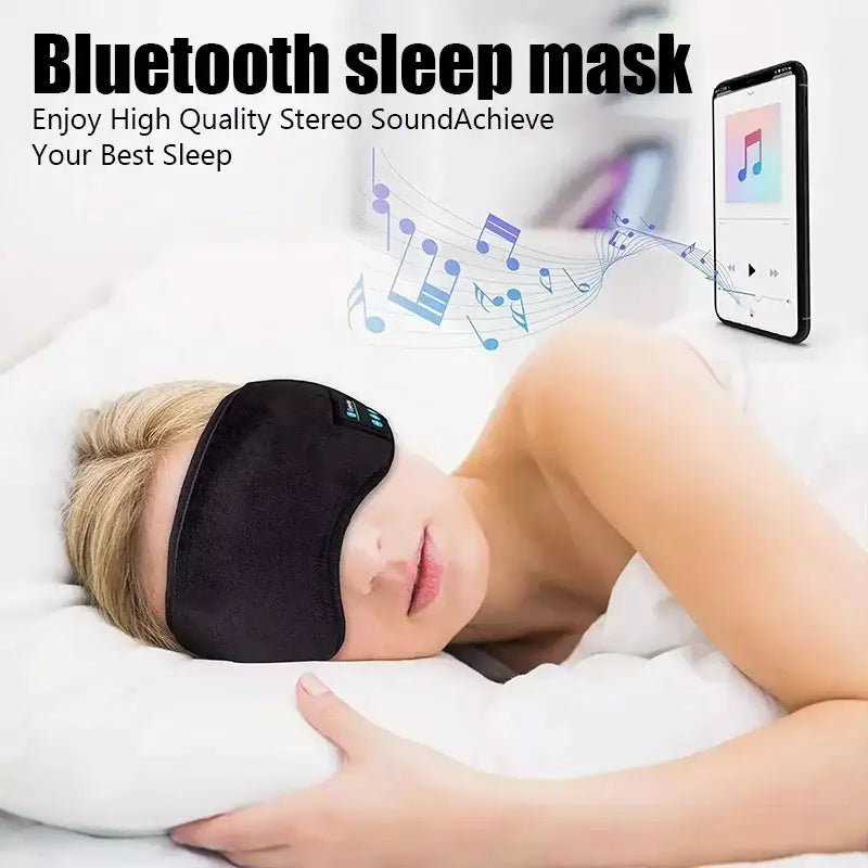 Bluetooth sleeping headphones eye mask worn by person lying on pillow