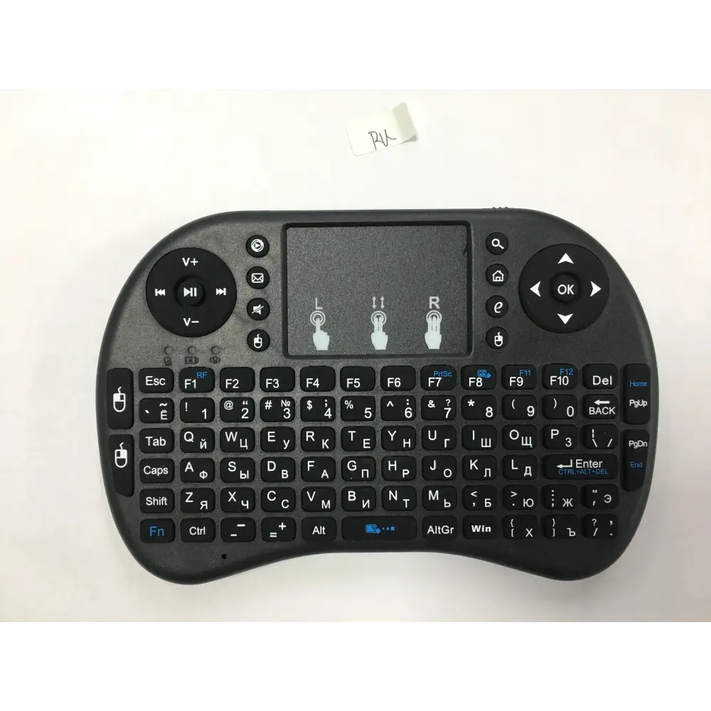 Mini wireless keyboard with touchpad and multimedia controls - workspace tech essentials