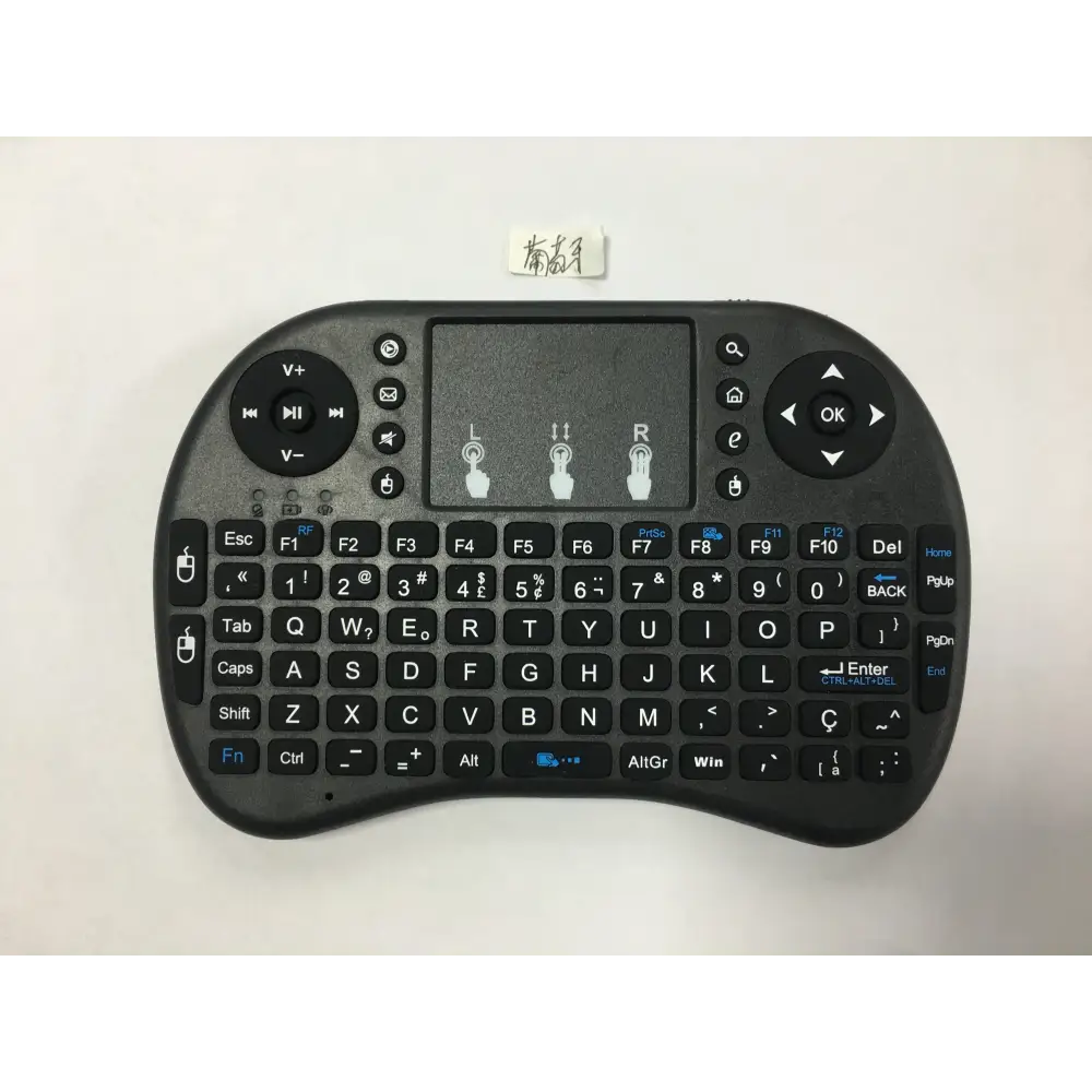 Mini wireless keyboard with touchpad and media controls for an upgraded workspace